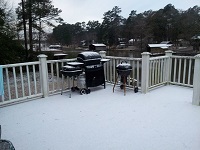 Snow and sleet accumulates on a porch in Lake Blackshear. Photo courtesy of Debbie Fullerton as posted on the WFXL Facebook page.