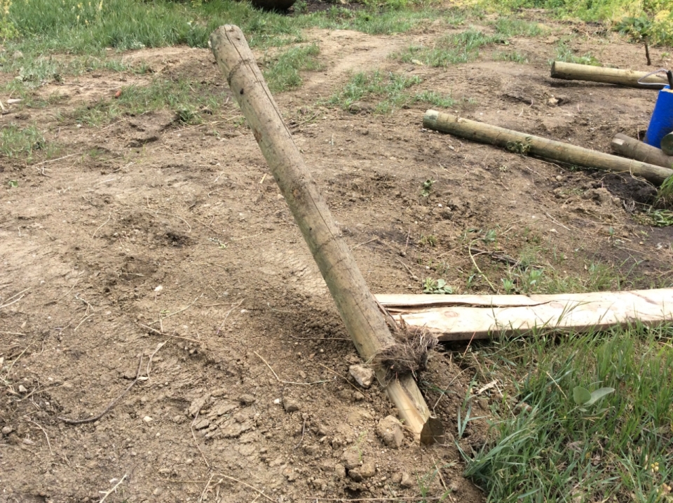 Two fence posts snapped at ground level (NWS Damage Survey)