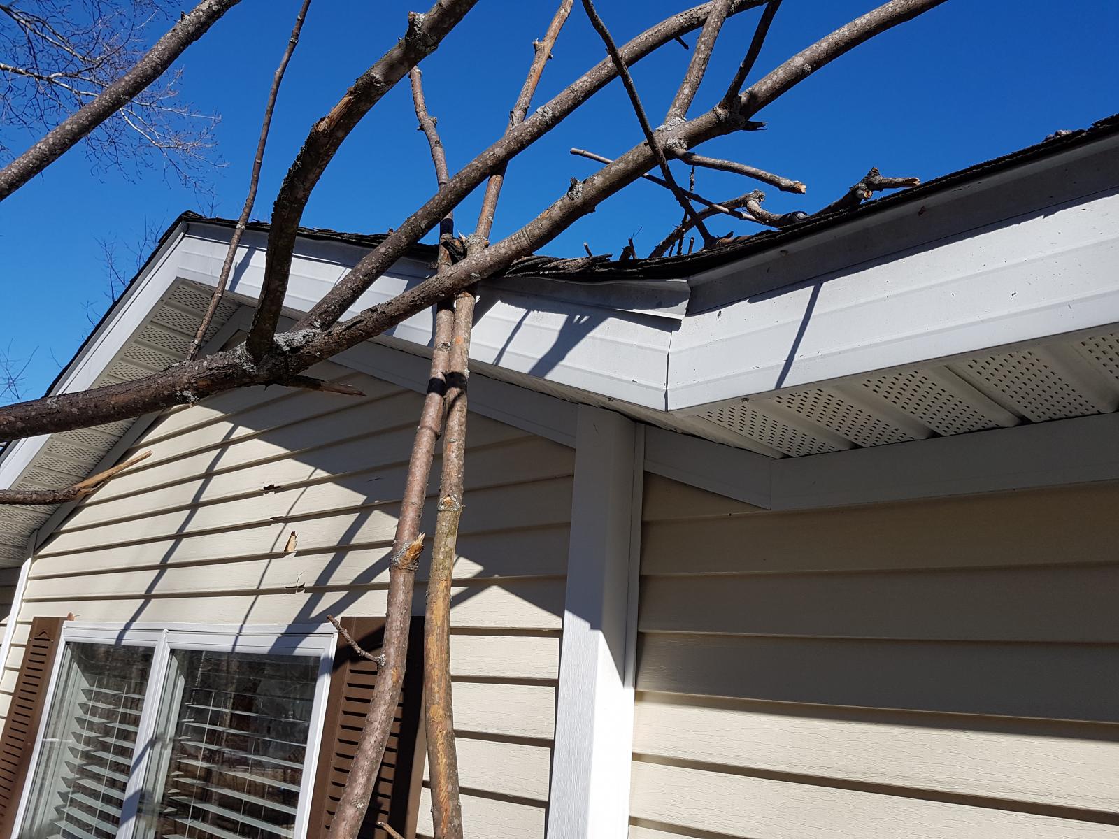 Tim Willson damage to house from strong winds - East Jordan