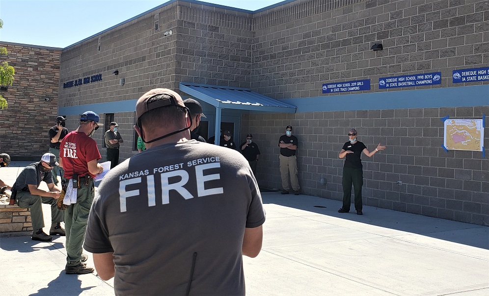 NWS Incident Meteorologists briefs fire crews on the Pine Gulch fire.