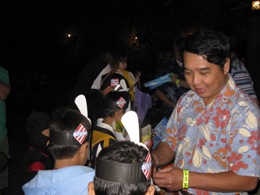 NWS Brownsville Information Technology Officer Toan Tran with costumed children at Boo and the Zoo, Brownsville, TX, in 2009