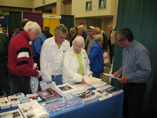 Alfredo Vega of the NWS Brownsville/Rio Grande Valley Public Service Unit answers questions at the 2011 Winter Texas Expo