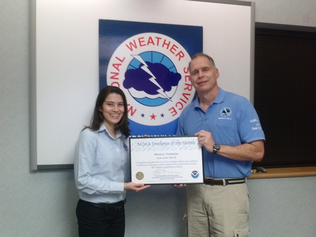 NWS Brownsville/Rio Grande Valley Forecaster Maria Torres (right) received NOAA Employee of the Month Certificate for January 2015 from Steve Drillette, Meteorologist-in-Charge