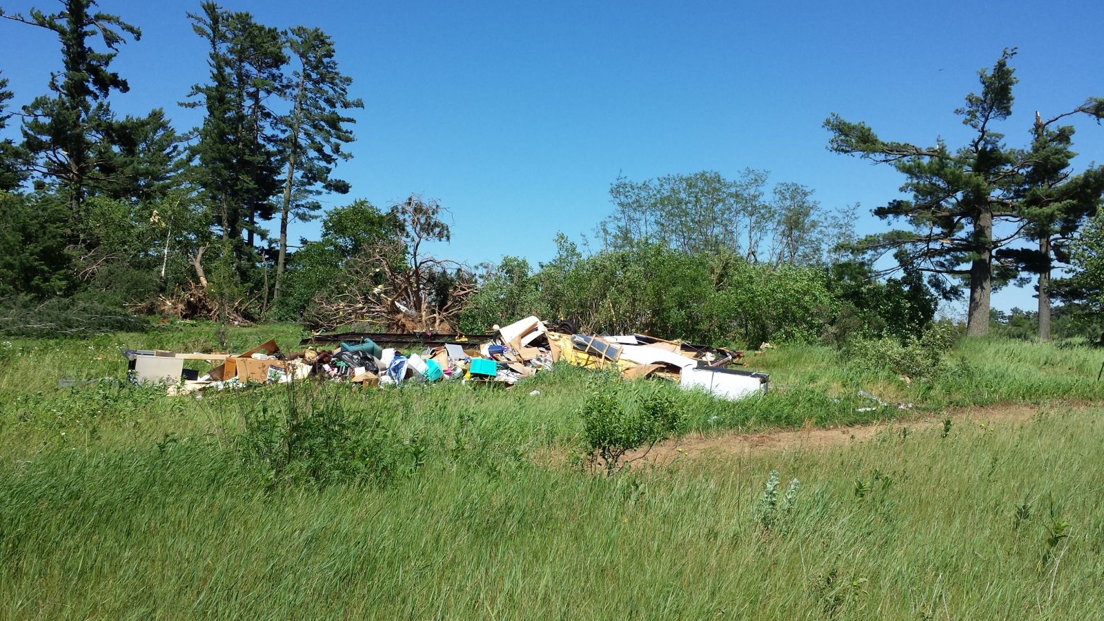 A manufactured home was destroyed 2.5 miles south of Deerwood, MN