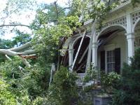 [ Downed tree damages home ]