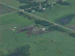 Aerial view of damaged farm near Woonsocket.