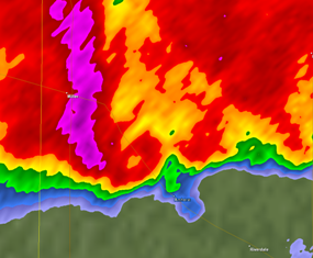 KUEX radar reflectivity with donut hole in hook echo approximately 4 miles north of Amherst at 426 pm CDT.
