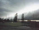 ...same shelf cloud...moving farther away. No rain occurred with this cloud feature.