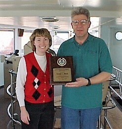Amy presenting a Voluntary Ship Observer award on the Joseph L Block
