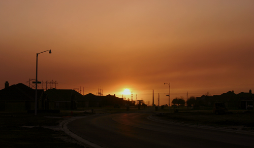 Looking west from Lubbock, the smoke from the New Mexico fire creates an red-orange sunset (photo by Todd Lindley)
