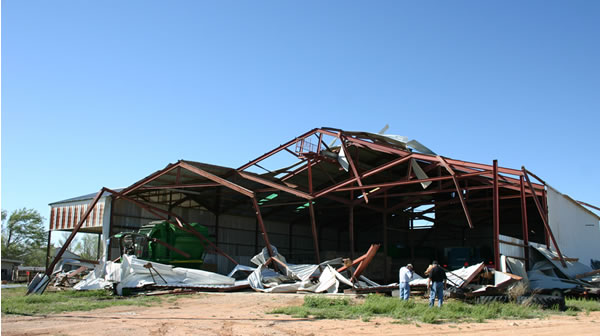 Damage to the Star Route Cotton Gin by a tornado Friday night. (picture taken by Todd Lindley, NWS Lubbock).