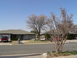 A picture taken from a south Lubbock neighborhood near the beginning of the wind/dust event on 20 February 2012. Click on the image for a larger view.  