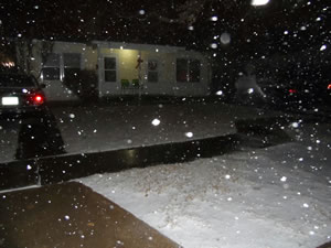 Photo of snow falling at Tech Terrace in Lubbock