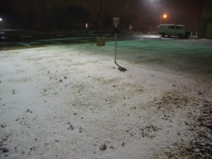 Photo of snow falling at the Science Specturm in south Lubbock
