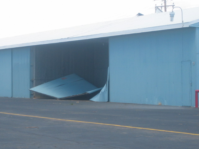 photo showing damage to a hangar