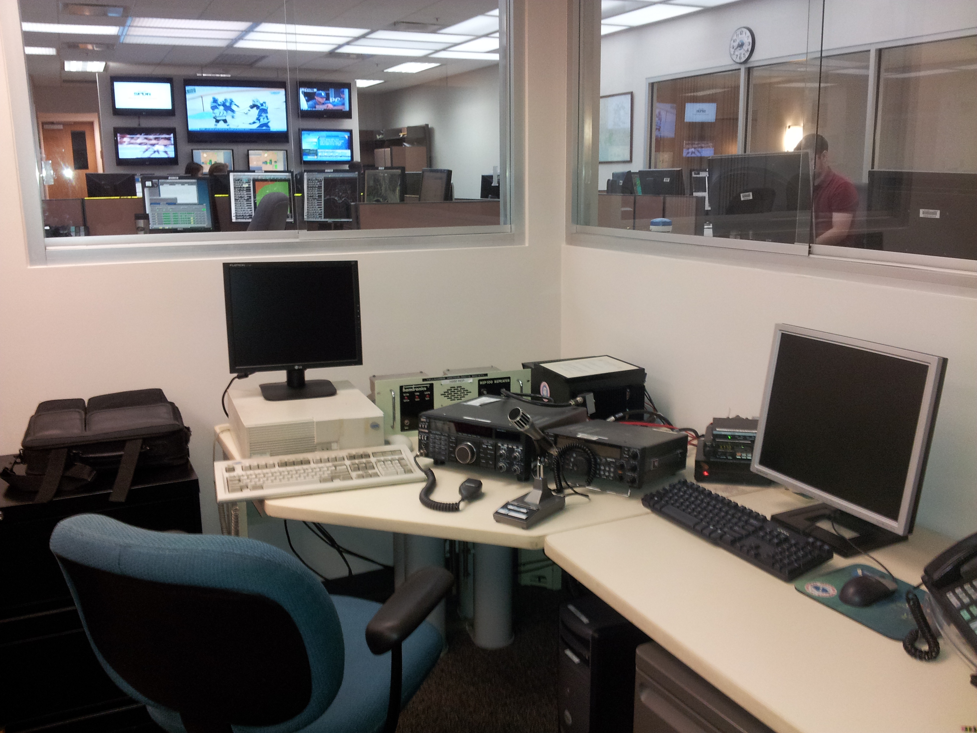 A picture of equipment in our HAM Network Control cubicle, located adjacent to the operations room.