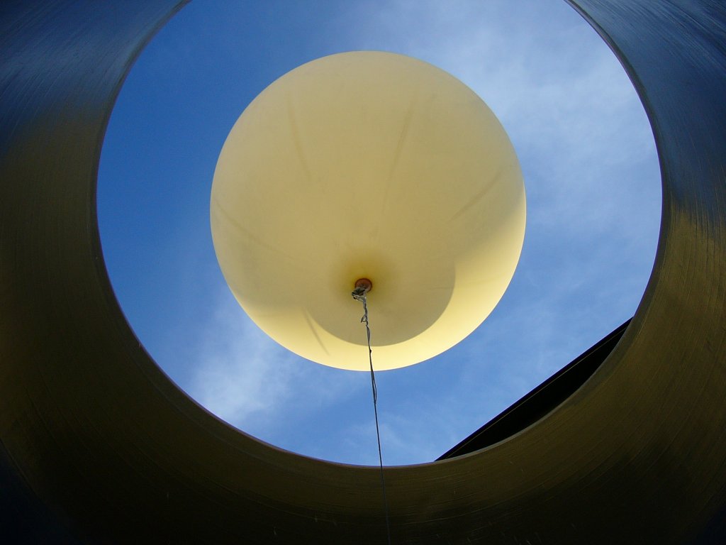 Photograph of the weather balloon before it is released through the rooftop launch tube.