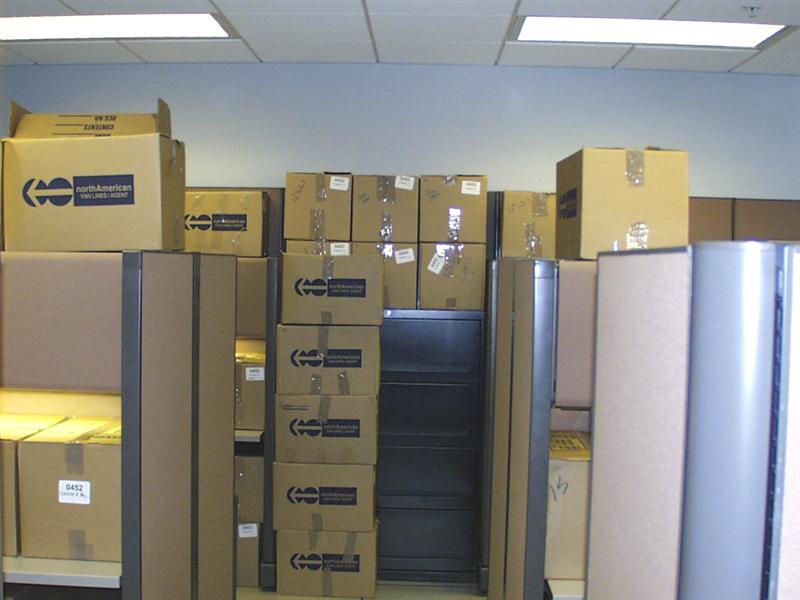A picture showing just a small percentage of the boxes that needed to be packed and unpacked.
