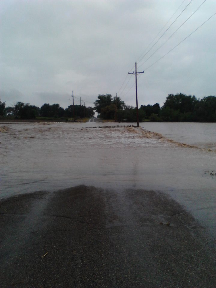 Photo of flooded roadway near Roswell, NM. Image by Amy Cook.