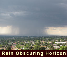 photo of rain shaft obscuring horizon
