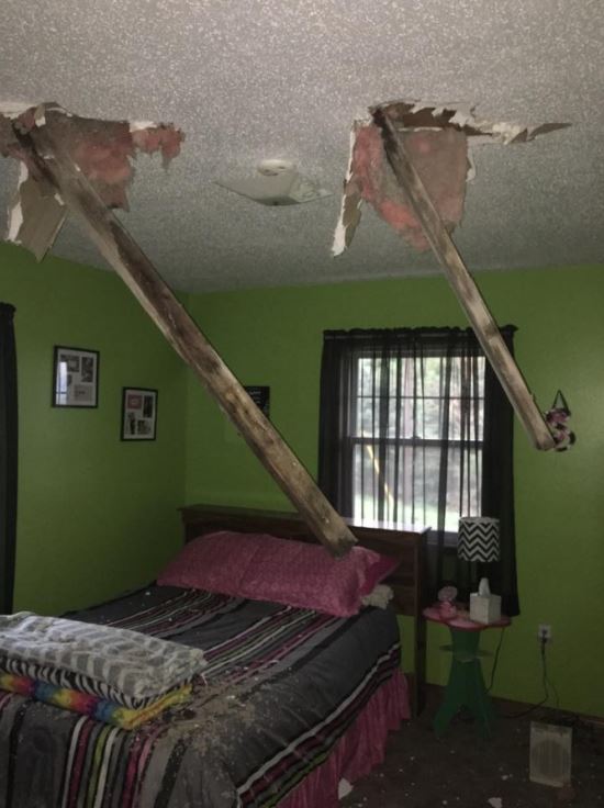 Beams from the shed went through the roof of the house.  (Juanita Propst - Facebook)