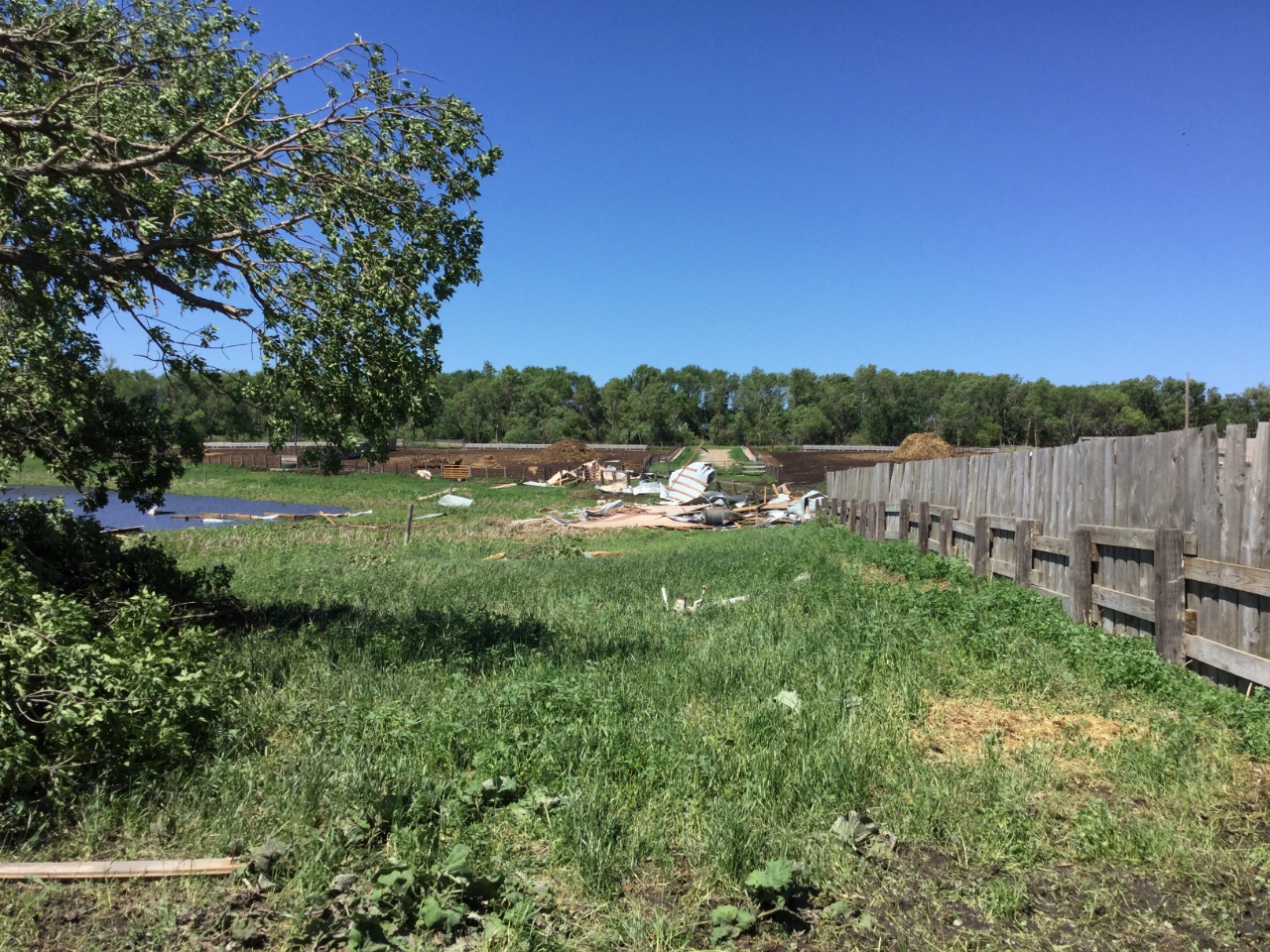 The remains of the storage shed to the north of the original location. (NWS Storm Survey)