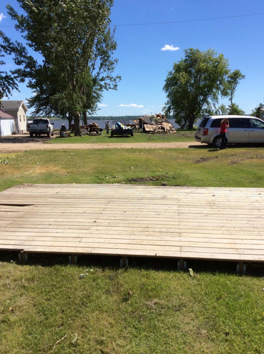 The remains of the storage shed to the north of the original location. (NWS Storm Survey)