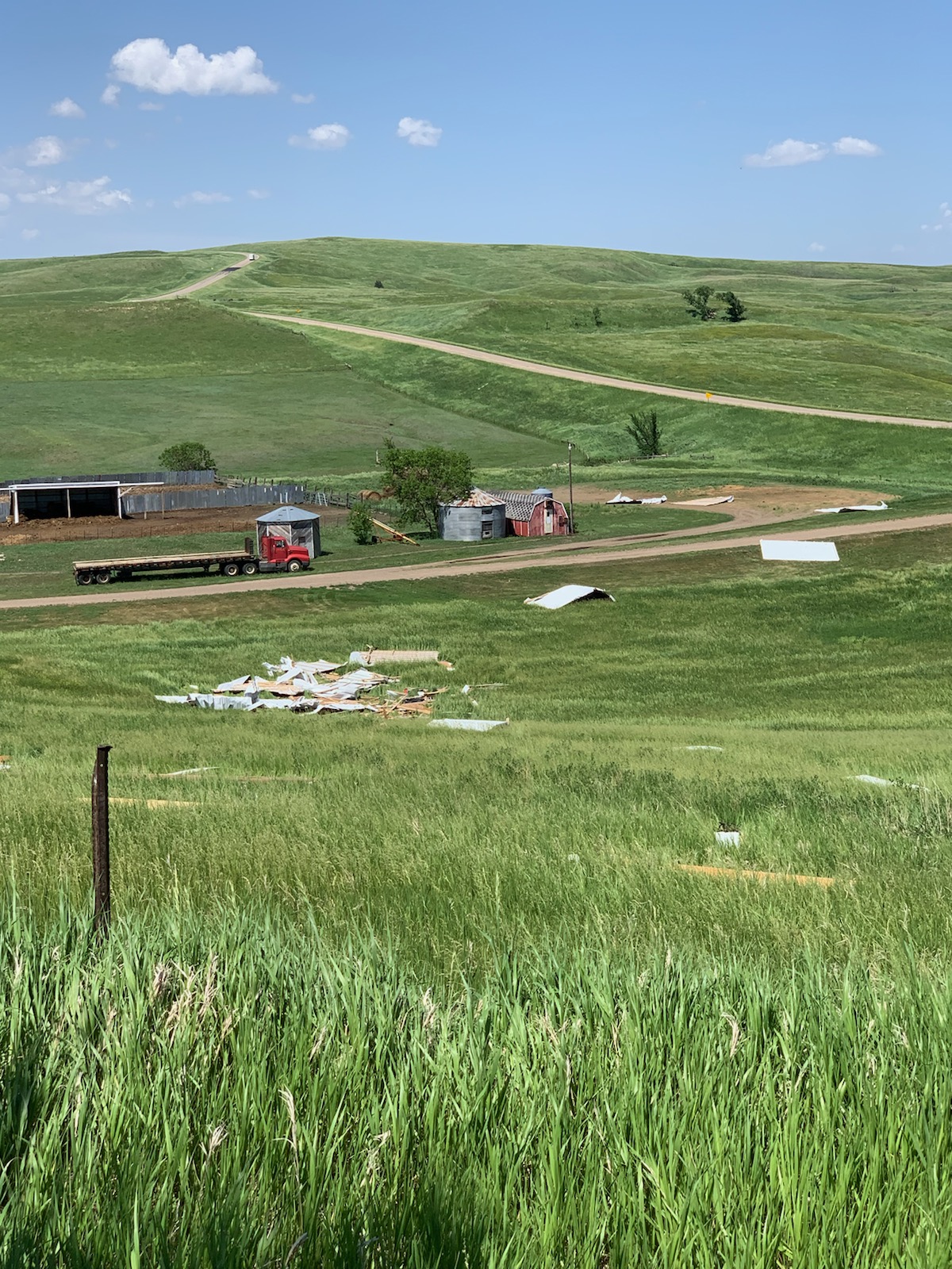 Parts of the storage shed were spread down the hill and up to a quarter mile away. 