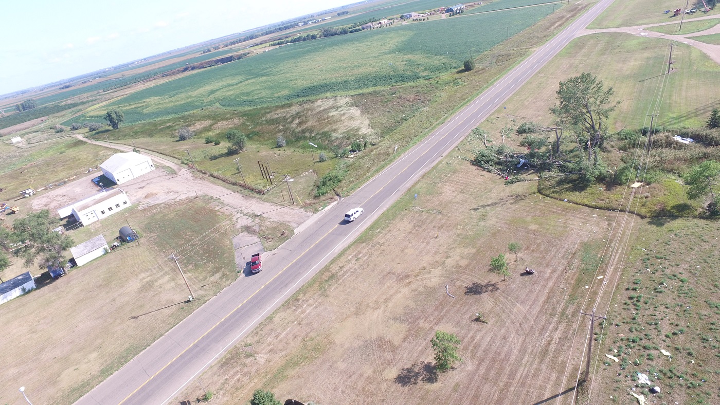 Tornado damaged trees before crossing US 212 and moving through cattails on the east side of Redfield, SD (Spink County EM & Planning and Zoning)