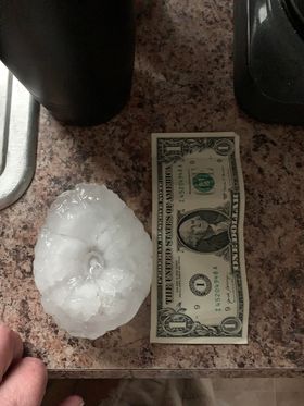 Â  Â  Softball sized hail 2 Miles North of Timber Lake, SD - Photo from Grady Kraft