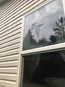 	Hail damage to window 2 Miles North of Timber Lake, SD - Photo from Grady Kraft