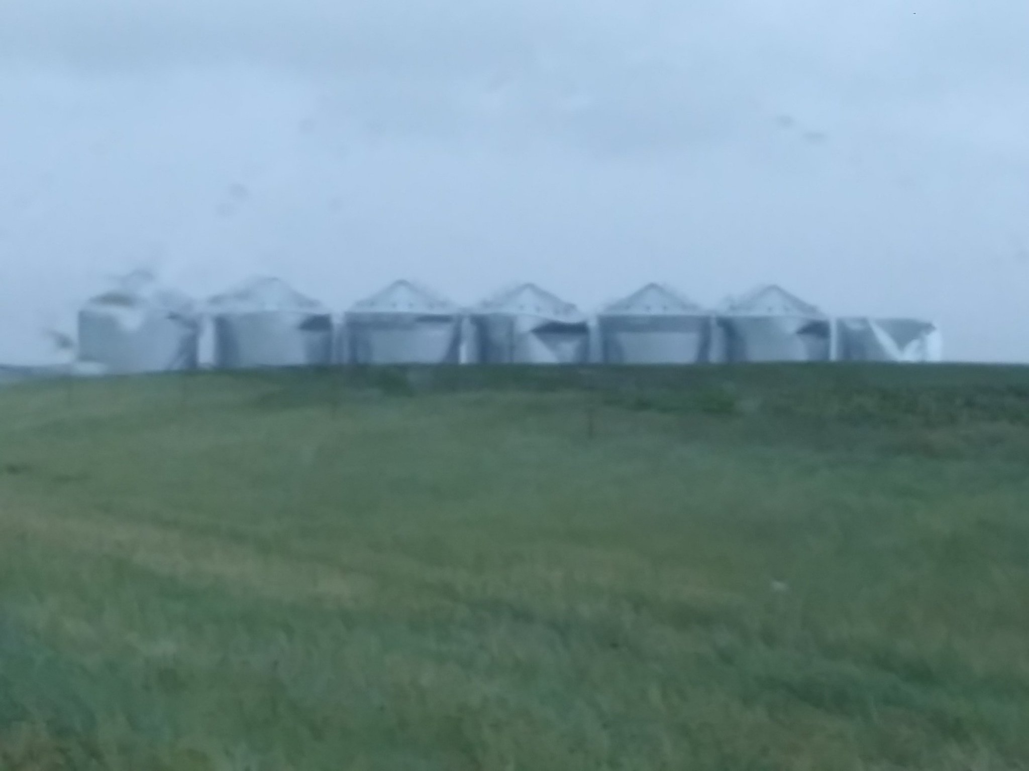 Damaged grain bins 4 miles to the north of Onida, SD - Photo from KCCR Radio