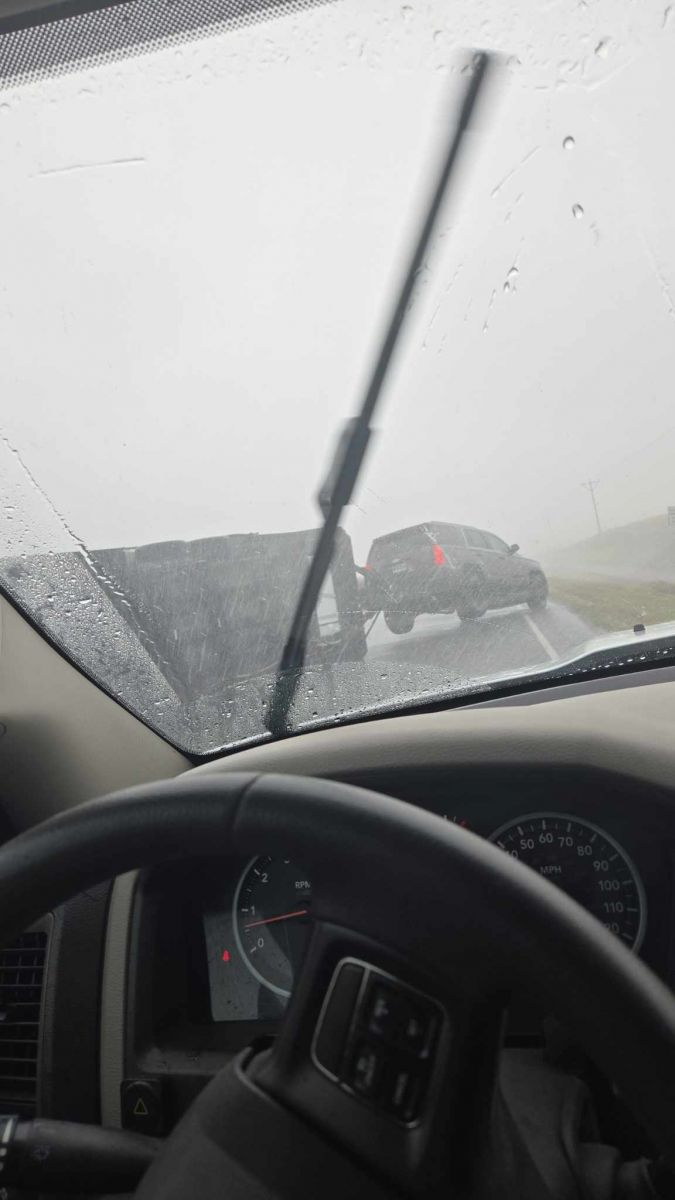 Photo from Bryson Vetch of a towed trailer flipped on US-12 around 2 miles east of Mobridge. 