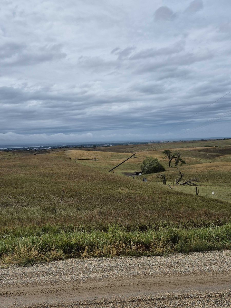 Photo of the broken power poles to the east-northeast of Mobridge, SD, looking to the west. 