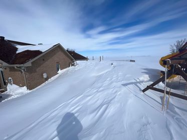 Large drift next to a house 2 miles east of Barnard, SD (Brittany Foley)