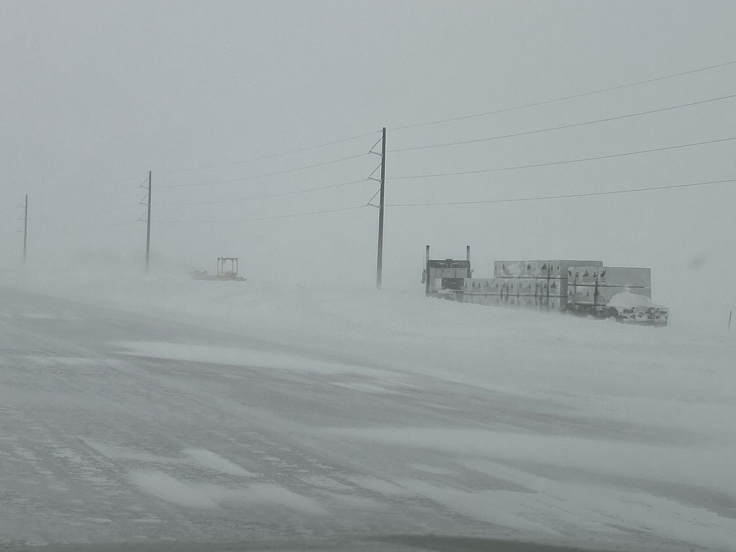 	View of US12 from Craven's Corner, near Ipswich, SD at 1:30 PM on April 4th. Visibility from falling snow was less than 1/2 mile.Â  (Image from SD DOT)
