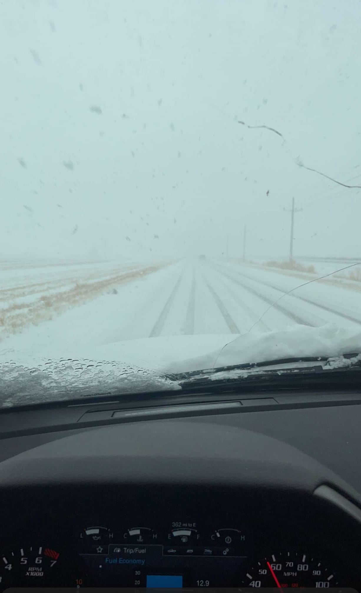 Photo of snowy roads between Dumas and Cactus, Texas on February 15th, 2023. Photo by Alfredo Chavez