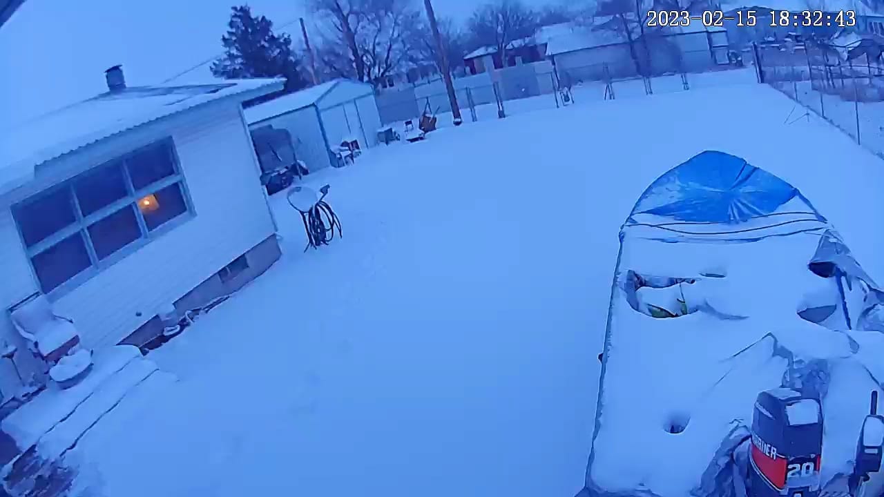 Photo by Theresa Loya of a snow covered boat in a backyard in Boise City, Oklahoma on February 15th, 2023