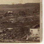 Part of the destroyed residential section is shown in this photo taken after the tornado. Several homes are badly damaged and many are completely destroyed.