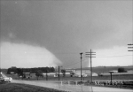 This picture was taken by a county sheriff at his spotter position.  It shows the tornado when it was 2 miles southwest of Charles City.