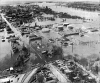 Flooded Causeway - Importance of the dike across Monitor and Bantam Streets is evidenced in this view facing south across the Causeway.  Eight inches of water covered the Causeway on April 17th.  Edward M. Huebner - La Crosse Tribune 