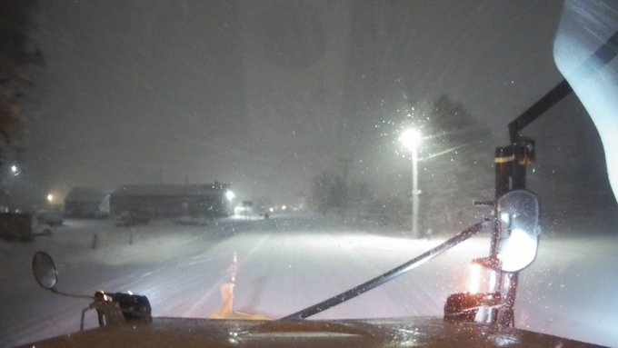 Snow plow photo of a snow covered road in Waukon, IA.