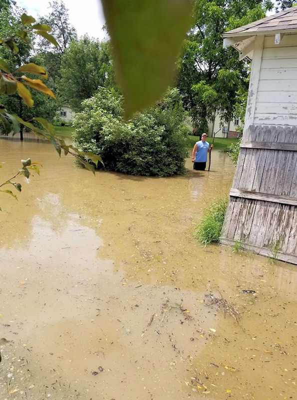 This "pond" flooded my yard and garage after the creek went over the banks in Blair, WI (Bobby Bishop)