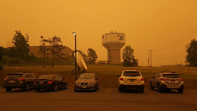 Sky full of smoke, parking lot at NWS Binghamton.