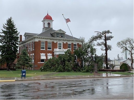 Akron Colorado courthouse wind damage with bent flagpole