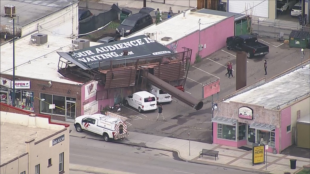 Billboard snapped off 1898 S Broadway, Denver