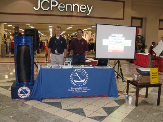 Budding Forecaster Rob Hart and Warning Coordination Meteorologist Barry Goldsmith at NWS Brownsville booth, La Plaza Mall Hurricane Expo 2009