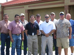 Warning Coordination Meteorologist Barry Goldsmith (center) posing with agricultural and hunting instructors from Texas Parks and Wildlife, June, 2009 (Click for larger image)