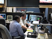 Joe Tomaselli gives weather brief to Brownsville International Airport manager (click to enlarge)