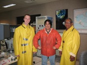 Jim Campbell, Rob Hart, and Fred Vega steel for a wet radiosonde launch (click to enlarge)